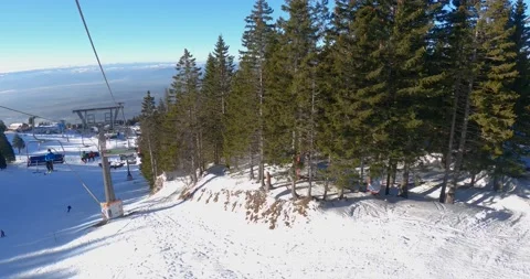 POV point of view riding with ski elevator in winter resort Krvavec, Slovenia Stock Footage 147684265