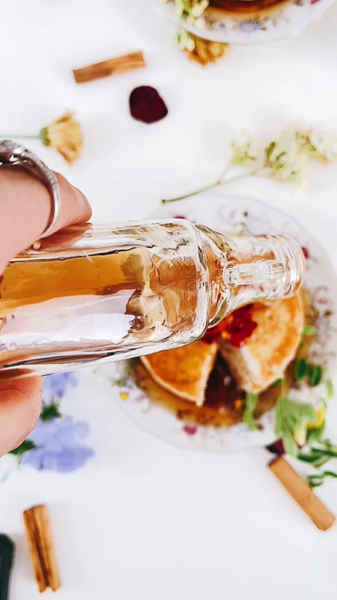 POV, Point of View of someone pouring syrup on pancakes, point of view, Stock Footage 227402769