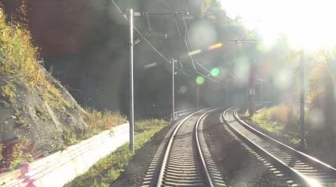 POV Point of view train pass railway mountain forest sun light sunlight journey Stock Footage 45112534