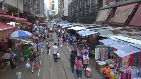 POV Point of view tram pass traditional market Hong Kong crowed shop shopper day Stock Footage 46362715
