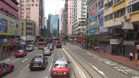 POV Point of view tramway cross famous Hong Kong crowded downtown busy road day Video stock 81158065
