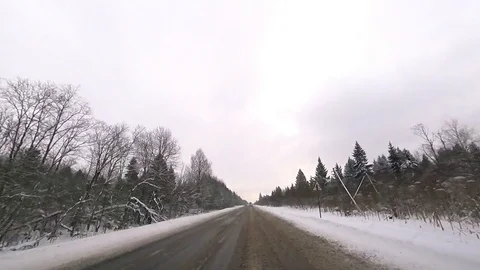 POV point of view - The view from a moving car outsidein the winter Vídeos de archivo 86194083