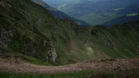 POV point of view walking along hiking mountain trail path, People Footsteps Stock Footage 79687487