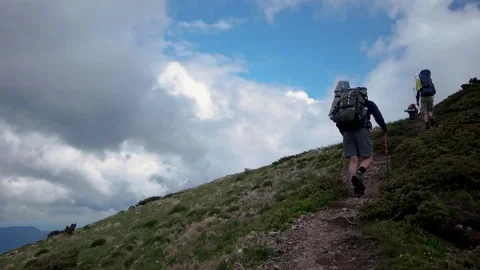 POV point of view walking along hiking mountain trail path, People Footsteps Vídeos de archivo 79688701