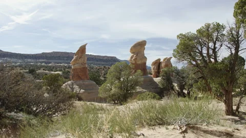 POV point of view walking in Devil's Garden Utah, climbing sand hill slow motion Stock Footage 248580046
