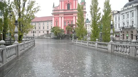 POV point of view walking over old Triple Bridge in Ljubljana city, Slovenia Stock Footage 142102503