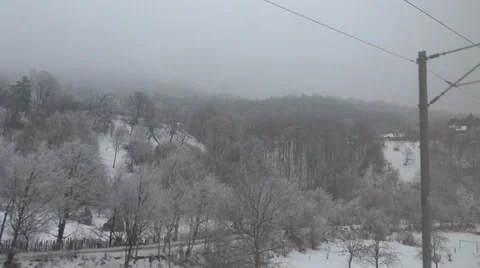 POV point view window train winter season mountain forest covered snow vacation Stock Footage 35333282