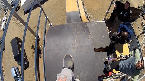 POV of pro skater on a mini mega ramp with a big air at the end. Stock Footage 98308897
