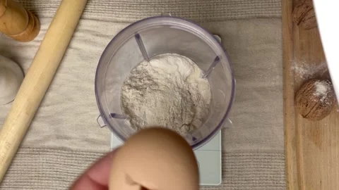 Pov process of making pancake mix, mixing flour, milk and egg Stock Footage 244420889