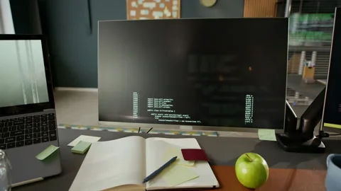 POV of Programmer Coding in Modern Office Stock Footage 306838650