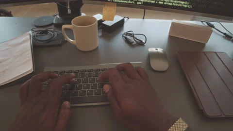 POV of Programmer Coding in Office Stock Footage 224053046