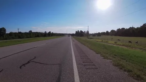 POV pulling over on a rural country highway with the sun beaming . Stock Footage 158120128