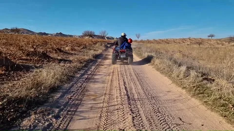 POV quad adventure through the spellbinding scenery of Cappadocia. Stock Footage 262888088