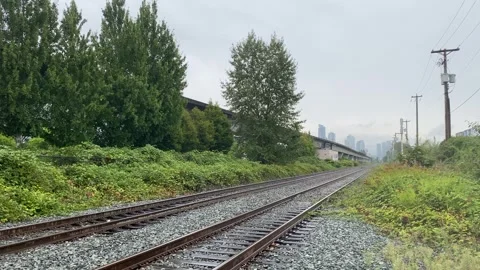 POV Rainy Opening Intro Empty Railway Transportation with Trees Stock Footage 282549974