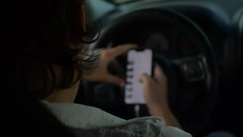 POV rear view of man driver checking car auction app... Stock Footage 324632356