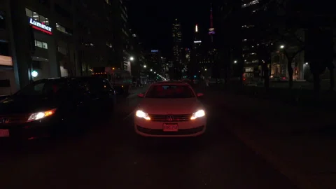 POV reverse night driving in Toronto streets during COVID 19 pandemic lockdown Stock Footage 145641220