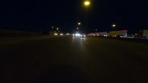 POV of reverse rear view shot roads and highways on a very dark night Vídeo Stock 156440182