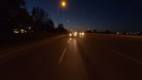 POV of reverse rear view shot roads and highways on a very dark night Видео 156442118