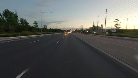 POV of reverse rear view shot roads and highways at dusk Vidéo 156446662