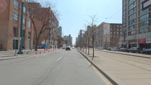POV reverse shot driving in downtown Toronto city streets Stock Footage 151874166