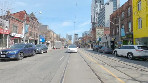 POV reverse shot driving in downtown Toronto city streets Stock Footage 151874787