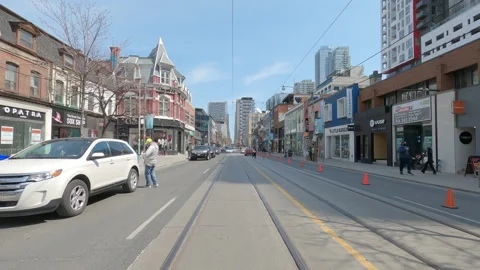 POV reverse shot driving in downtown Toronto city streets Stock Footage 151875218