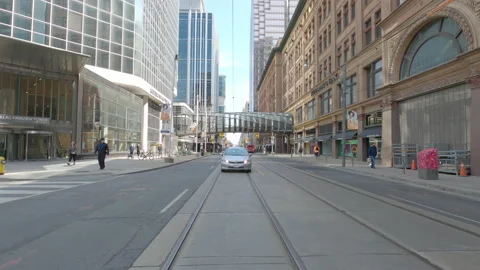 POV reverse shot driving in downtown Toronto city streets Stockbeeldmateriaal 151881004