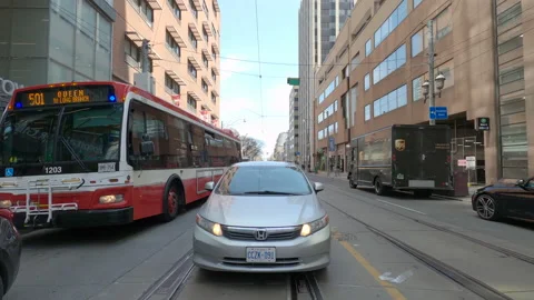 POV reverse shot driving in downtown Toronto city streets Vidéo 151882544