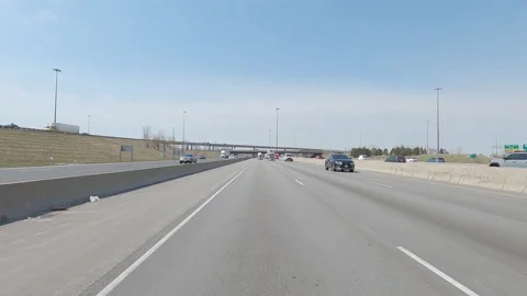 POV reverse shot driving platre on highway with truck and car traffic Stock Footage 151886380