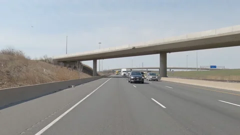 POV reverse shot driving platre on highway with truck and car traffic Vídeos de archivo 151893092