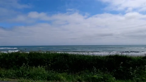 POV right side of Pacific ocean coast from car driving on highway, Sakhalin 스톡 동영상 209853283