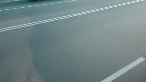 POV. Road view from bus window. Slow motion.UltraHD. 4k.Traveling by the bus. Stock Footage 123309090