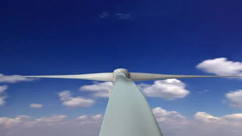 POV on Rotor of 3D Rendered Wind Turbine Spinning on Blue Sky Background Stock Footage 332751900