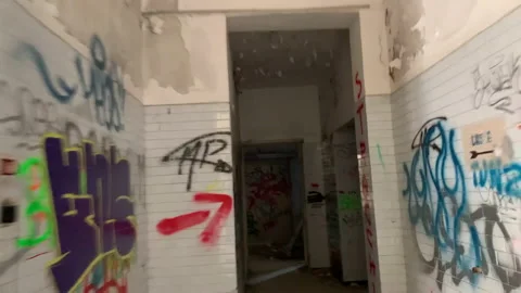 POV running in an abandoned hospital corridor Stock Footage