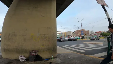 Pov running across a congested avenue while the traffic light is red for cars Video stock 149214289