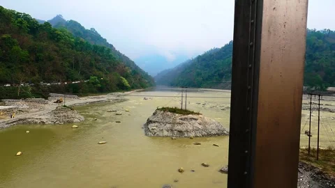 POV of Scenic Mountain River from Train in Dooars, West Bengal Stock Footage 283640365