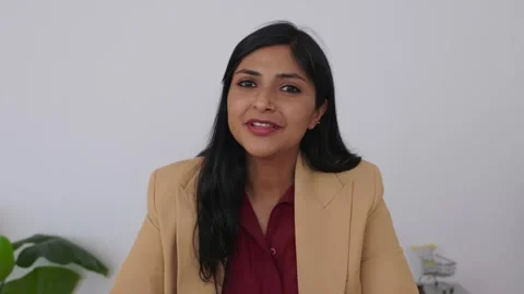 POV screen view of young Indian businesswoman talking during a video call. Stock Footage 345250876