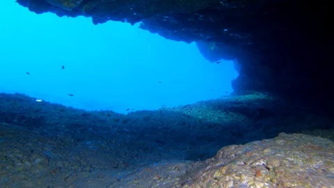 POV Scuba diver getting out of a cave - Underwater scene Stock Footage 119332674