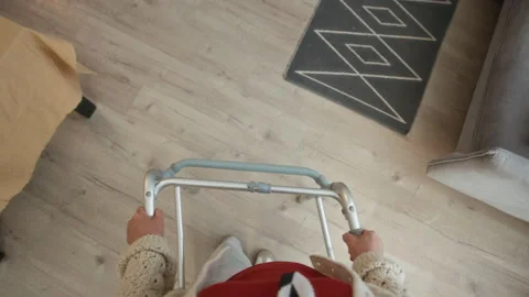 POV of Senior Using Walker in Nursing Home Stock Footage 306911372