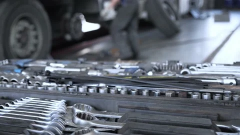 POV on set with professional tools. Mechanic repairing cargo trailer Stock Footage 152254439