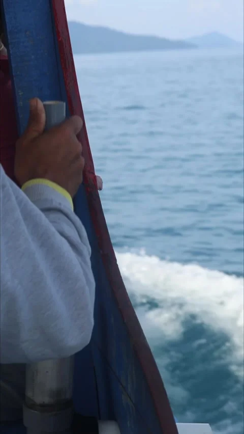 POV of Ship Captain Navigating Wooden Boat Through Ocean Waves Stock Footage 334566442