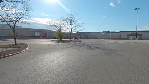 POV shopping mall empty retail stores closed in COVID 19 pandemic Stock Footage 153991422