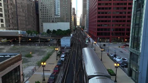 POV shot above train in Chicago downtown loop. Aerial tracking shot of Stock Footage 249990448