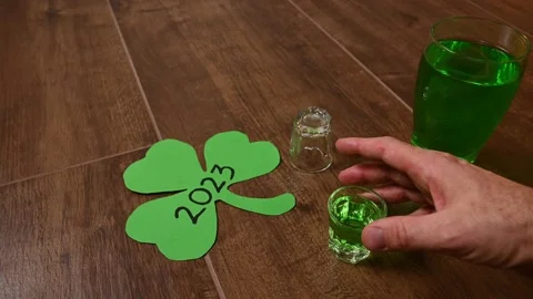 POV shot drinking on St Patrick's day Stock Footage 231558390