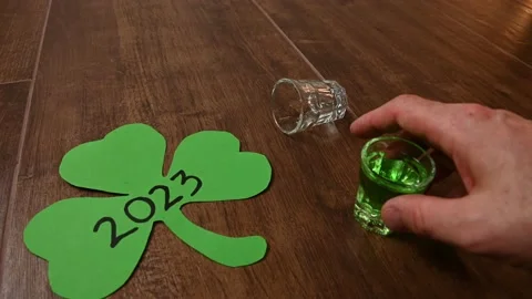 POV shot drinking on St Patrick's day Stock Footage 231721885