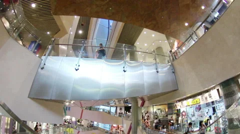 POV shot of an escalator going down in Langham Place mall Stock Footage 51114499
