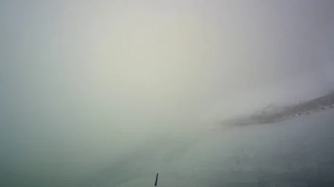 POV shot from the front of a plane flying fast through clouds. Stock Footage 74828505
