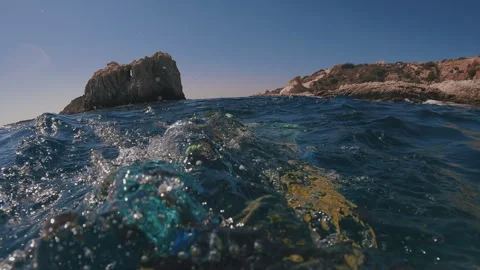POV shot, guy paddling with his fins underwater sailing away from beautiful Stock Footage 252207667