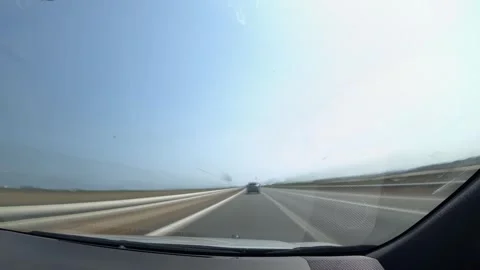 POV shot from inside a car with dashboard visible and time lapse of road li.. Stock Footage 314271740
