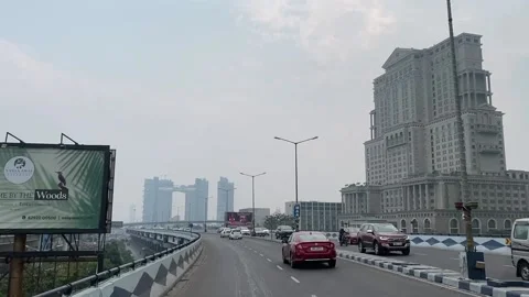 POV shot of Maa Flyover with view of Atmosphere and ITC Royal Bengal. Video stock 239415445